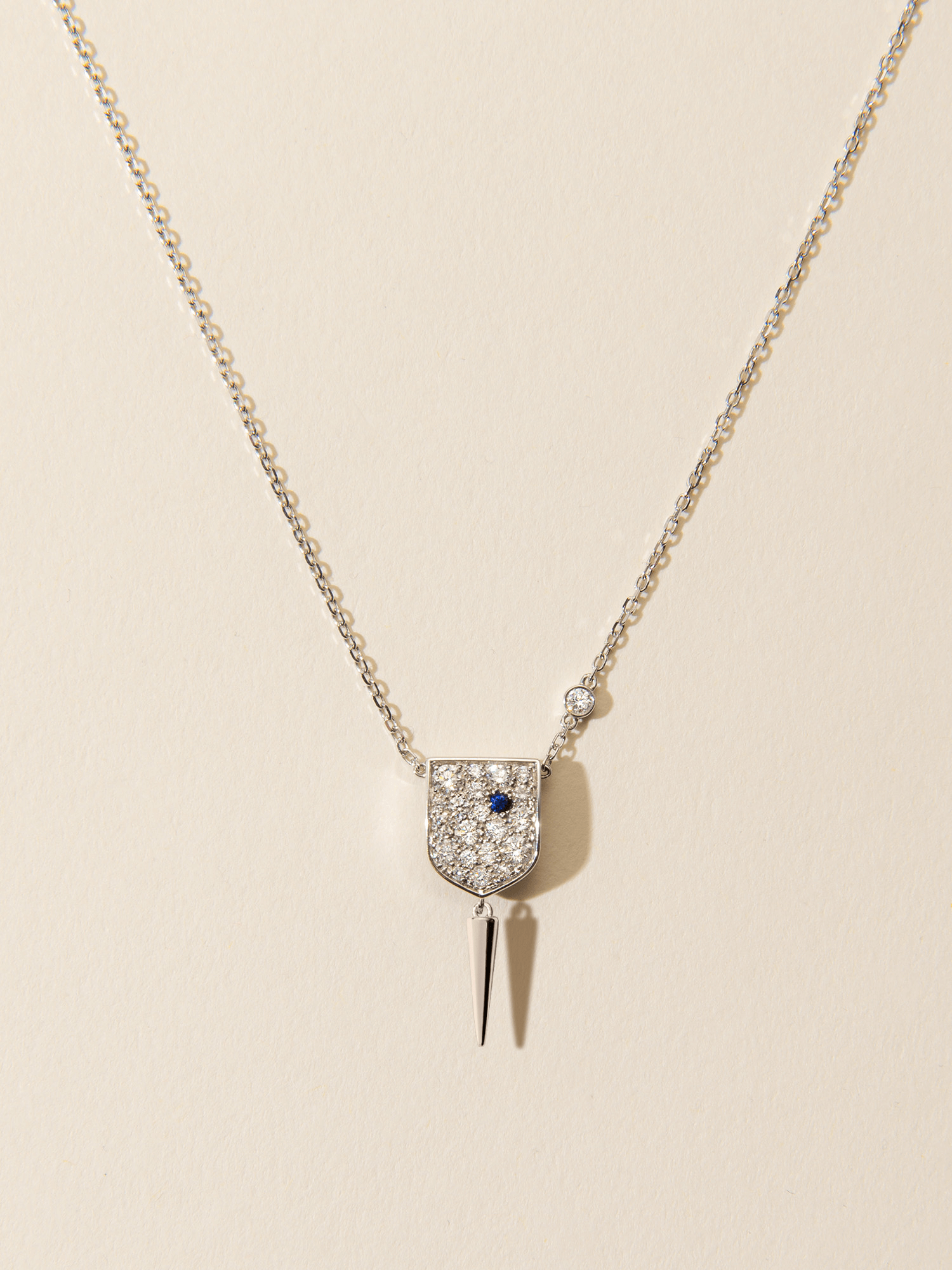 Personalised Golden Shield necklace paved with diamonds and sapphire